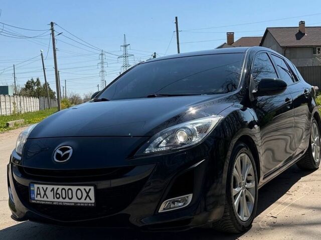 Черный Мазда 3, объемом двигателя 2 л и пробегом 193 тыс. км за 7700 $, фото 1 на Automoto.ua