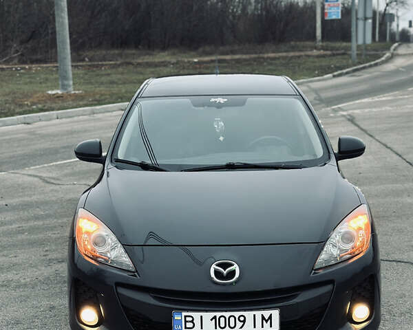 Черный Мазда 3, объемом двигателя 1.6 л и пробегом 247 тыс. км за 7599 $, фото 1 на Automoto.ua
