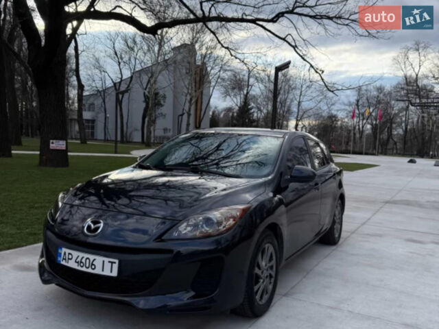 Черный Мазда 3, объемом двигателя 2 л и пробегом 214 тыс. км за 8000 $, фото 1 на Automoto.ua