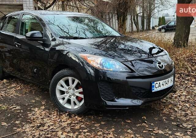 Черный Мазда 3, объемом двигателя 2 л и пробегом 240 тыс. км за 8450 $, фото 1 на Automoto.ua