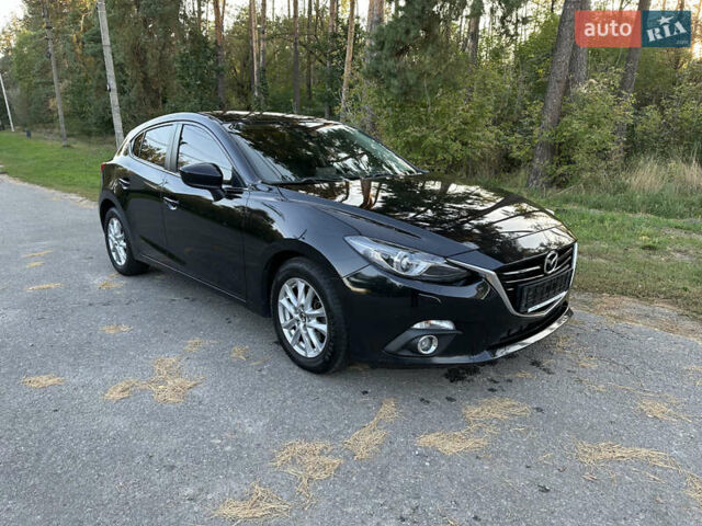 Черный Мазда 3, объемом двигателя 2 л и пробегом 143 тыс. км за 13650 $, фото 1 на Automoto.ua