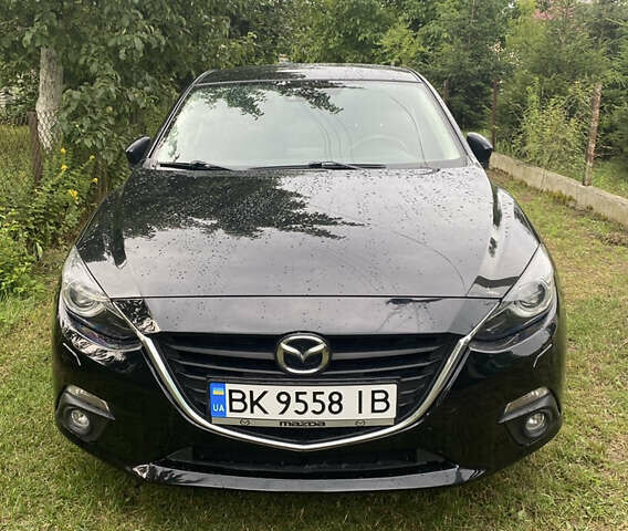 Черный Мазда 3, объемом двигателя 1.5 л и пробегом 243 тыс. км за 12500 $, фото 1 на Automoto.ua
