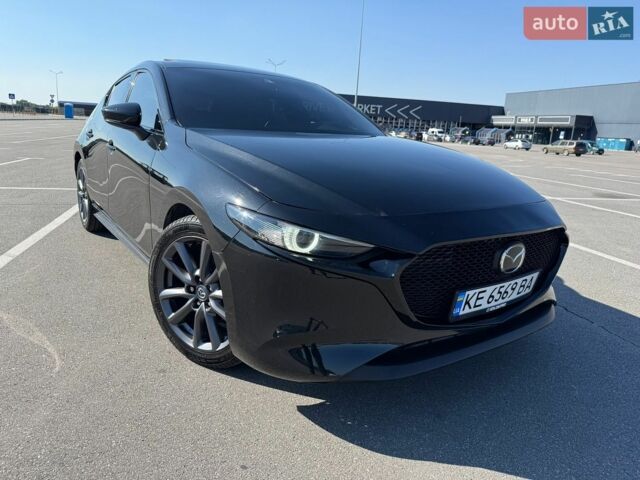 Черный Мазда 3, объемом двигателя 2.49 л и пробегом 106 тыс. км за 12700 $, фото 1 на Automoto.ua