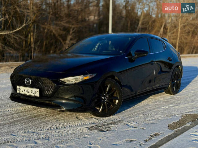 Черный Мазда 3, объемом двигателя 2.49 л и пробегом 150 тыс. км за 15899 $, фото 1 на Automoto.ua