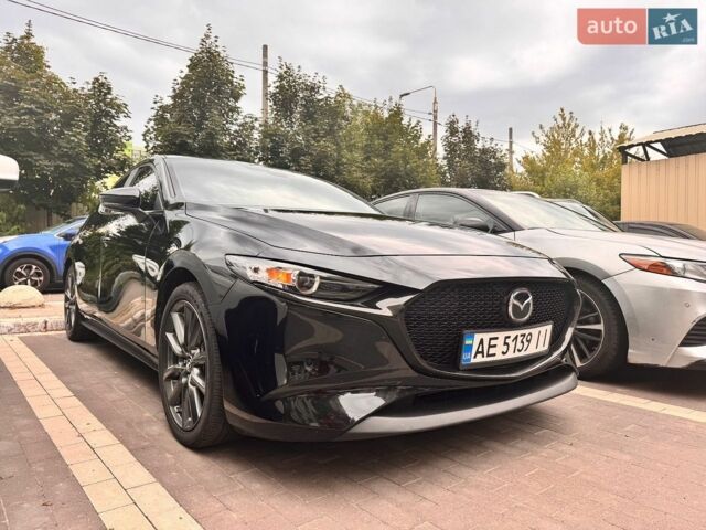 Черный Мазда 3, объемом двигателя 2.49 л и пробегом 64 тыс. км за 15500 $, фото 1 на Automoto.ua