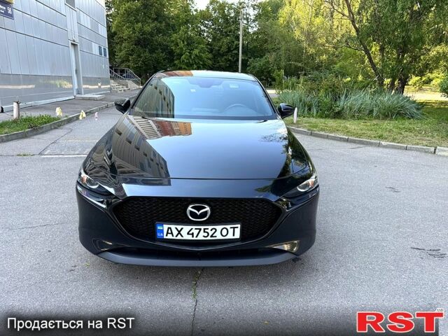 Черный Мазда 3, объемом двигателя 2 л и пробегом 74 тыс. км за 15500 $, фото 1 на Automoto.ua
