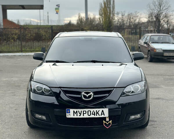 Черный Мазда 3, объемом двигателя 2 л и пробегом 188 тыс. км за 5700 $, фото 1 на Automoto.ua