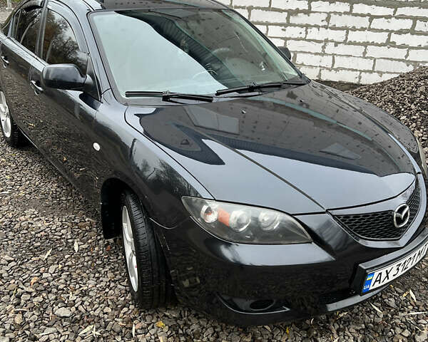 Мазда 3 2004 в Богодухове на Automoto.ua Черный Мазда 3, объемом двигателя 1.6 л и пробегом 346 тыс. км за 4800 $, фото 1 на Automoto.ua