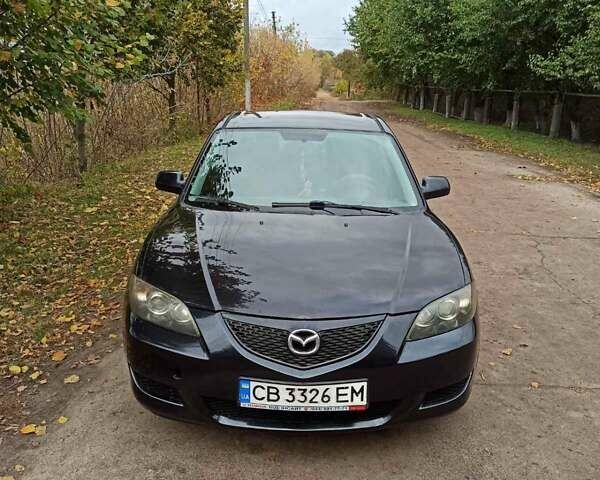 Чорний Мазда 3, об'ємом двигуна 2 л та пробігом 319 тис. км за 4000 $, фото 1 на Automoto.ua