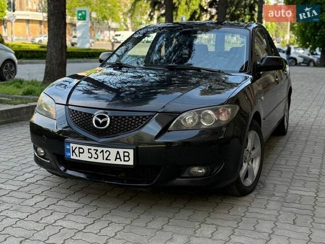 Черный Мазда 3, объемом двигателя 1.6 л и пробегом 156 тыс. км за 3450 $, фото 1 на Automoto.ua