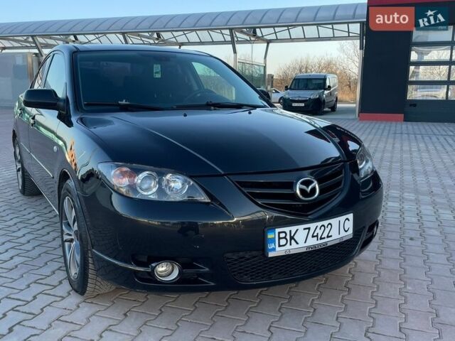 Черный Мазда 3, объемом двигателя 2 л и пробегом 295 тыс. км за 3899 $, фото 1 на Automoto.ua