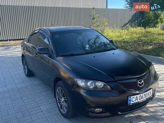 Черный Мазда 3, объемом двигателя 1.6 л и пробегом 292 тыс. км за 3100 $, фото 1 на Automoto.ua