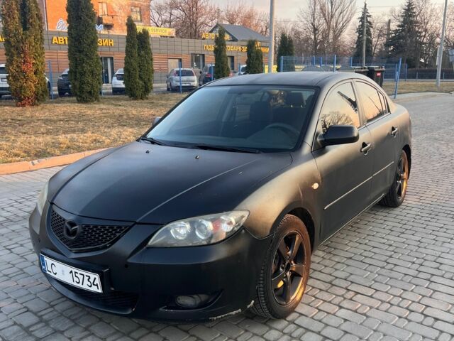 Черный Мазда 3, объемом двигателя 1.6 л и пробегом 200 тыс. км за 1800 $, фото 1 на Automoto.ua