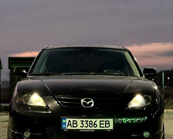 Черный Мазда 3, объемом двигателя 2 л и пробегом 346 тыс. км за 4700 $, фото 1 на Automoto.ua