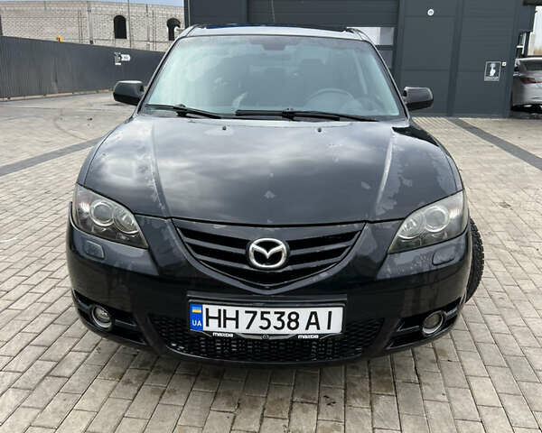 Черный Мазда 3, объемом двигателя 2 л и пробегом 232 тыс. км за 4700 $, фото 1 на Automoto.ua