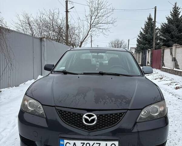 Чорний Мазда 3, об'ємом двигуна 1.6 л та пробігом 255 тис. км за 4000 $, фото 1 на Automoto.ua