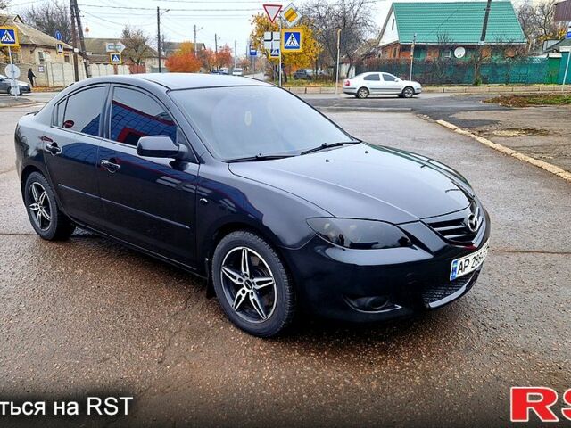 Черный Мазда 3, объемом двигателя 2 л и пробегом 173 тыс. км за 4600 $, фото 1 на Automoto.ua