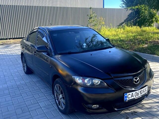 Чорний Мазда 3, об'ємом двигуна 1.6 л та пробігом 292 тис. км за 3100 $, фото 1 на Automoto.ua