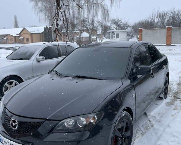 Черный Мазда 3, объемом двигателя 2 л и пробегом 325 тыс. км за 4500 $, фото 1 на Automoto.ua