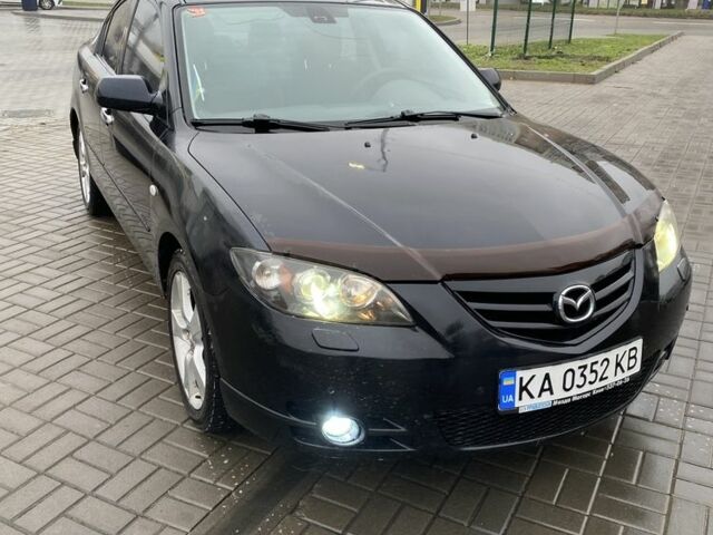 Черный Мазда 3, объемом двигателя 2 л и пробегом 184 тыс. км за 3699 $, фото 1 на Automoto.ua