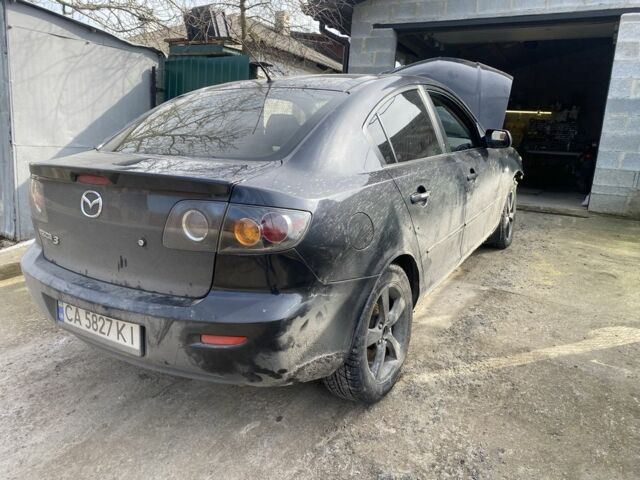 Черный Мазда 3, объемом двигателя 1.6 л и пробегом 240 тыс. км за 1700 $, фото 1 на Automoto.ua
