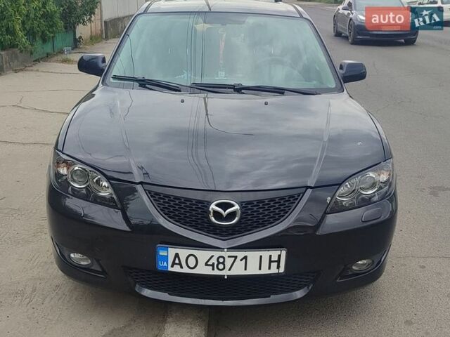 Черный Мазда 3, объемом двигателя 1.6 л и пробегом 157 тыс. км за 6500 $, фото 1 на Automoto.ua