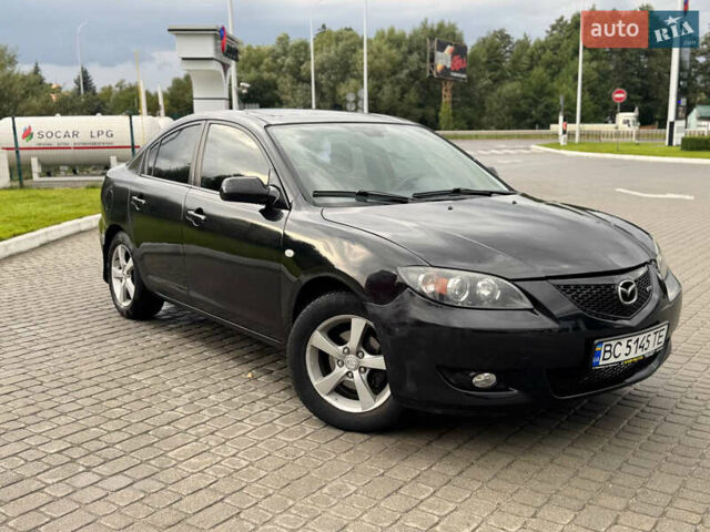 Чорний Мазда 3, об'ємом двигуна 1.6 л та пробігом 231 тис. км за 3650 $, фото 1 на Automoto.ua