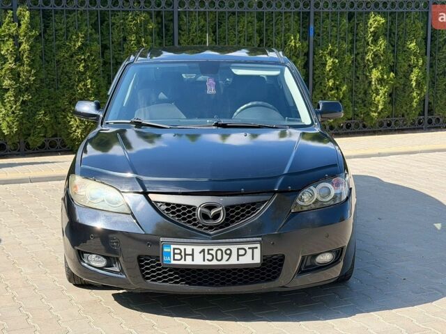Черный Мазда 3, объемом двигателя 1.6 л и пробегом 209 тыс. км за 4800 $, фото 1 на Automoto.ua