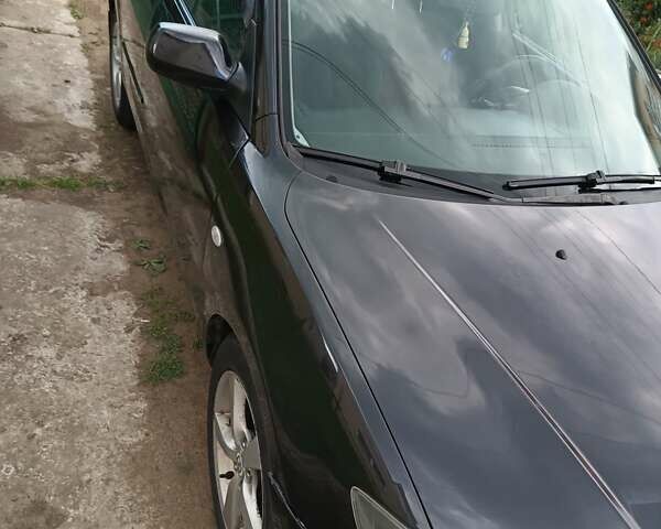 Чорний Мазда 3, об'ємом двигуна 1.6 л та пробігом 356 тис. км за 3000 $, фото 1 на Automoto.ua