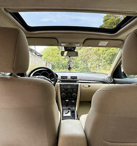 Черный Мазда 3, объемом двигателя 1.6 л и пробегом 175 тыс. км за 5200 $, фото 1 на Automoto.ua