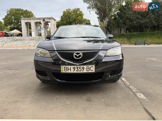 Черный Мазда 3, объемом двигателя 1.6 л и пробегом 312 тыс. км за 4700 $, фото 1 на Automoto.ua