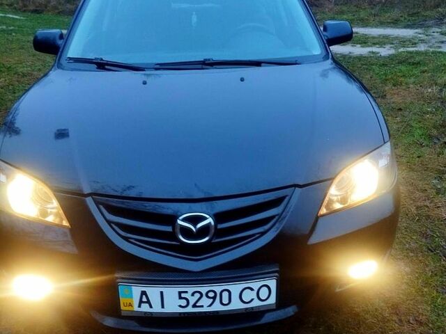 Черный Мазда 3, объемом двигателя 1.6 л и пробегом 24200 тыс. км за 3750 $, фото 1 на Automoto.ua