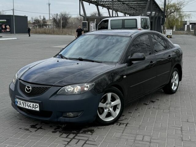 Черный Мазда 3, объемом двигателя 1.6 л и пробегом 250 тыс. км за 4550 $, фото 1 на Automoto.ua