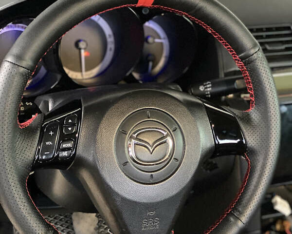 Черный Мазда 3, объемом двигателя 1.6 л и пробегом 176 тыс. км за 5800 $, фото 1 на Automoto.ua