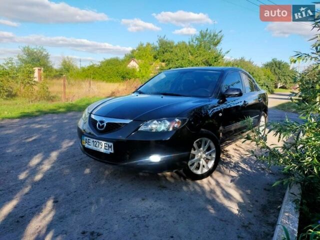Черный Мазда 3, объемом двигателя 2 л и пробегом 203 тыс. км за 5800 $, фото 1 на Automoto.ua
