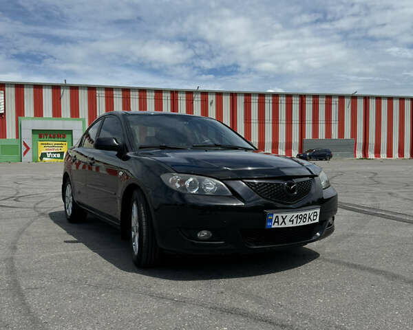 Черный Мазда 3, объемом двигателя 1.6 л и пробегом 199 тыс. км за 5100 $, фото 1 на Automoto.ua