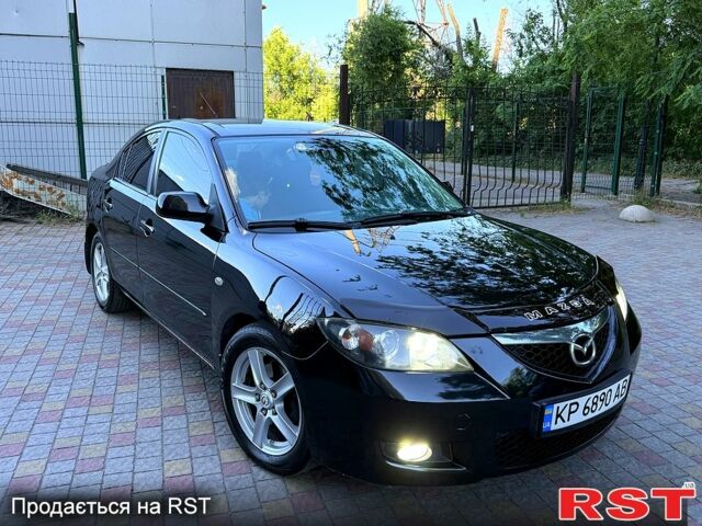 Черный Мазда 3, объемом двигателя 1.6 л и пробегом 219 тыс. км за 5800 $, фото 1 на Automoto.ua