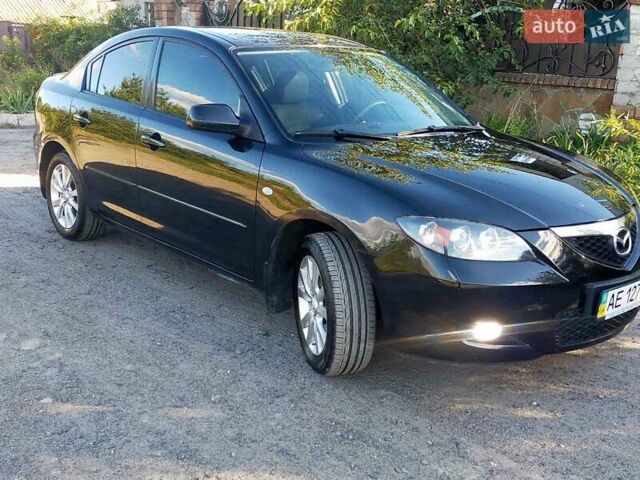 Черный Мазда 3, объемом двигателя 2 л и пробегом 202 тыс. км за 6000 $, фото 1 на Automoto.ua