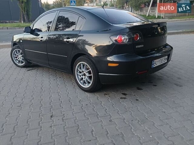 Черный Мазда 3, объемом двигателя 2 л и пробегом 225 тыс. км за 3450 $, фото 1 на Automoto.ua