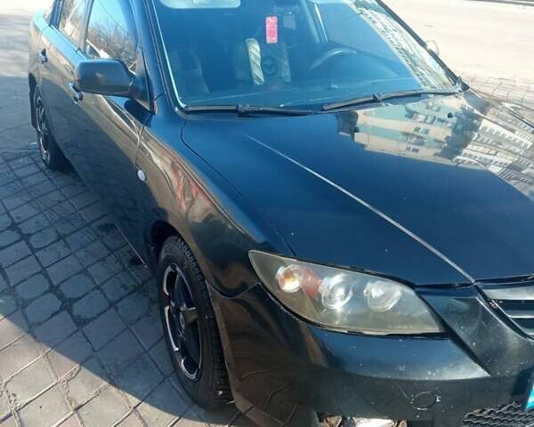 Черный Мазда 3, объемом двигателя 1.6 л и пробегом 280 тыс. км за 4500 $, фото 1 на Automoto.ua
