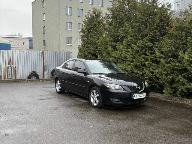 Черный Мазда 3, объемом двигателя 1.6 л и пробегом 288 тыс. км за 5000 $, фото 1 на Automoto.ua