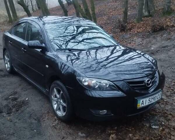 Черный Мазда 3, объемом двигателя 1.6 л и пробегом 243 тыс. км за 4499 $, фото 1 на Automoto.ua