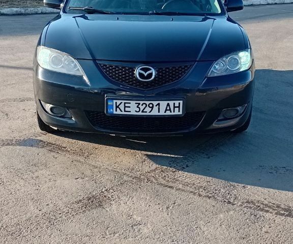 Чорний Мазда 3, об'ємом двигуна 1.6 л та пробігом 225 тис. км за 5800 $, фото 1 на Automoto.ua