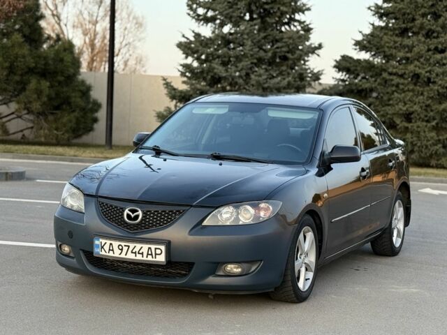 Черный Мазда 3, объемом двигателя 1.6 л и пробегом 255 тыс. км за 3999 $, фото 1 на Automoto.ua