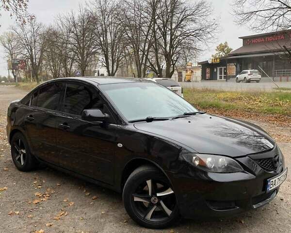 Черный Мазда 3, объемом двигателя 1.6 л и пробегом 300 тыс. км за 4600 $, фото 1 на Automoto.ua