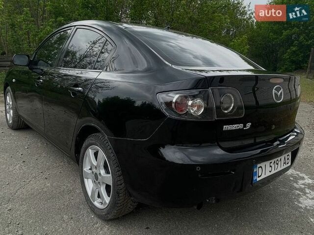 Черный Мазда 3, объемом двигателя 1.6 л и пробегом 335 тыс. км за 4250 $, фото 1 на Automoto.ua