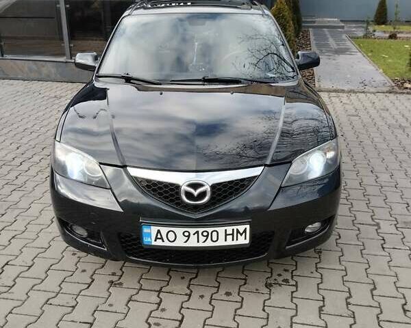 Черный Мазда 3, объемом двигателя 1.6 л и пробегом 300 тыс. км за 4500 $, фото 1 на Automoto.ua