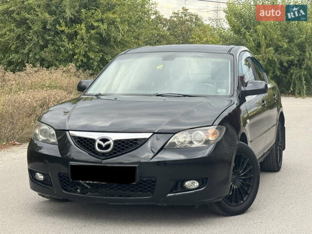 Черный Мазда 3, объемом двигателя 1.6 л и пробегом 201 тыс. км за 5900 $, фото 1 на Automoto.ua