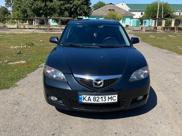 Черный Мазда 3, объемом двигателя 1.6 л и пробегом 129 тыс. км за 5500 $, фото 1 на Automoto.ua