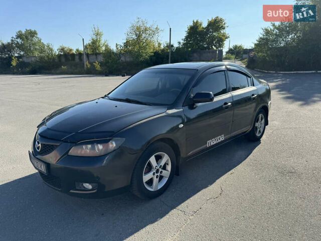 Черный Мазда 3, объемом двигателя 2 л и пробегом 150 тыс. км за 5999 $, фото 1 на Automoto.ua